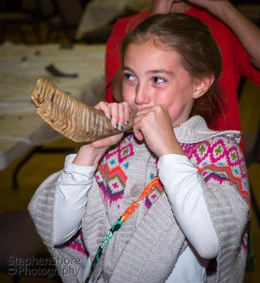 Student Blowing the Shofar