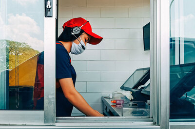 webbigstock-Fast-Food-Cashier-In-Drive-Thr-371564920.jpeg