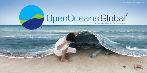 Child looking under a wave with OOG Horizontal Logo  2.png