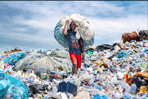 Boy Red Shorts Plastic Waste Scavenger Ghana 300x200.png