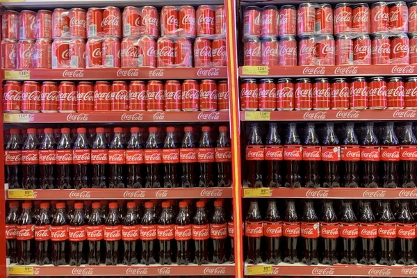 Coca Cola bottles and cans.png